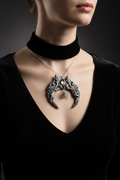 Gothic crescent moon necklace worn - lifestyle photo showing ornate baroque design with spider