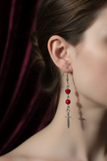 Red dagger earrings lifestyle