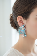 Soutache earrings worn on ear